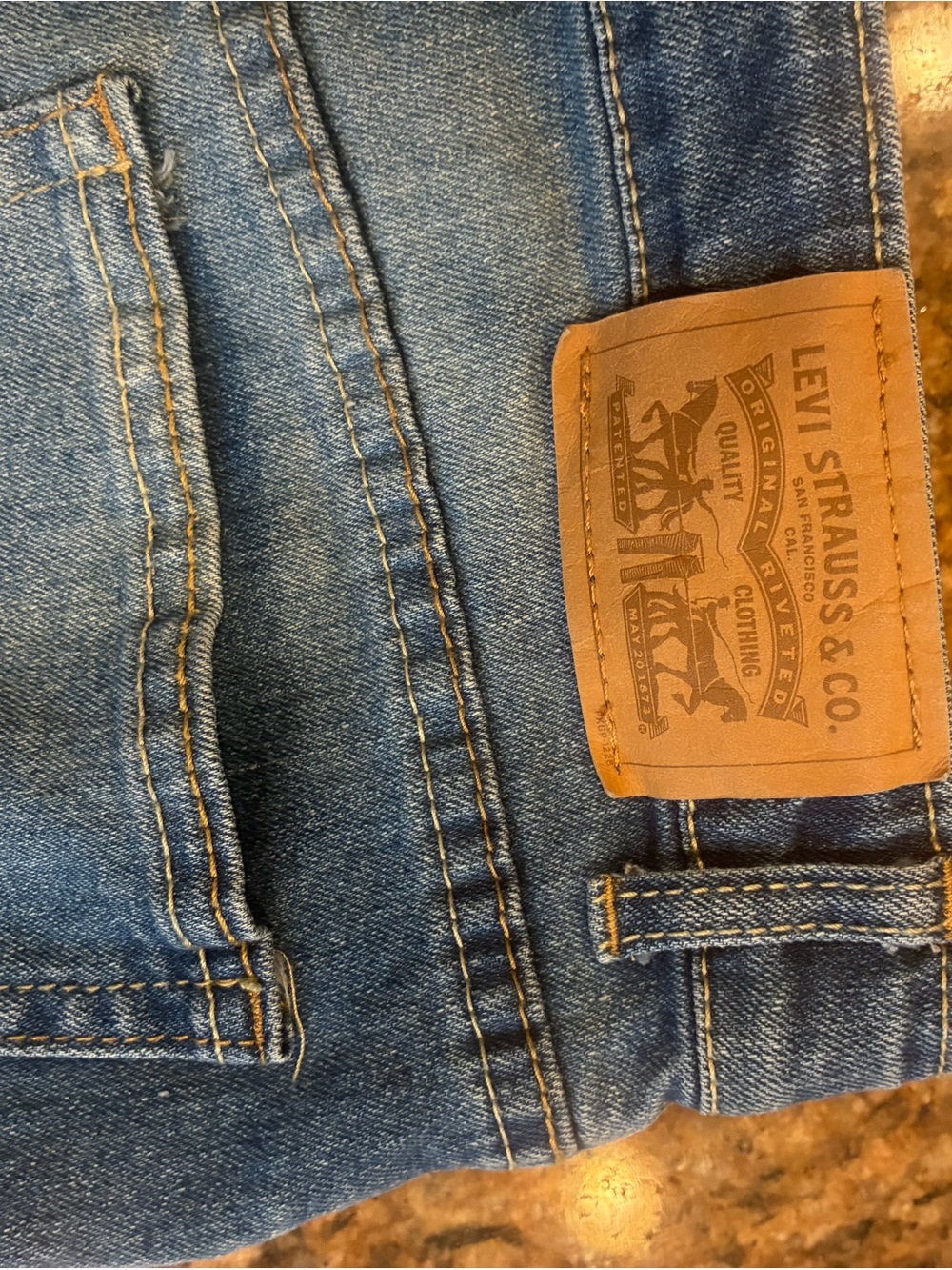 Levi's Women's Slim Blue Denim Jeans with Tan Leather Patch